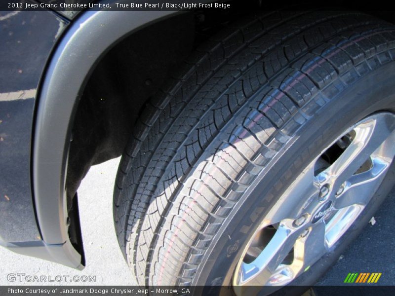 True Blue Pearl / Black/Light Frost Beige 2012 Jeep Grand Cherokee Limited
