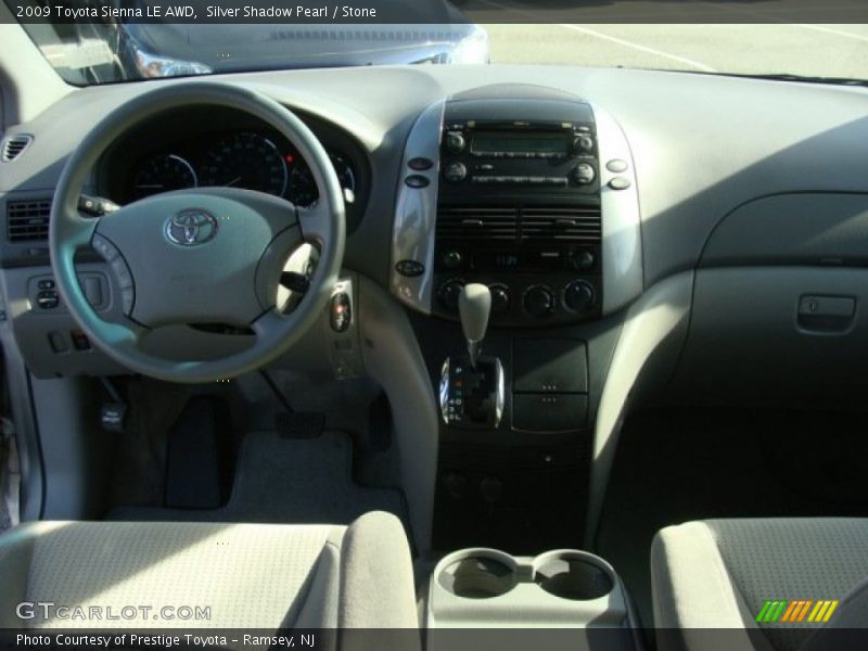 Silver Shadow Pearl / Stone 2009 Toyota Sienna LE AWD
