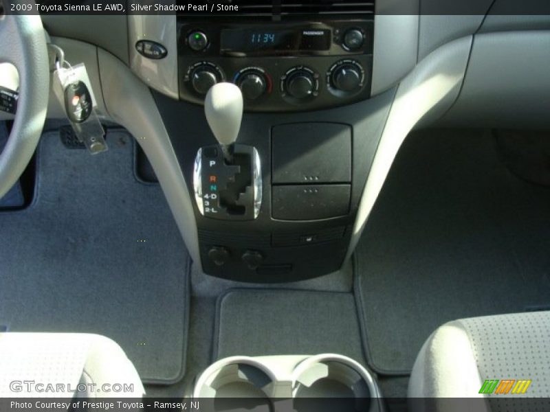 Silver Shadow Pearl / Stone 2009 Toyota Sienna LE AWD