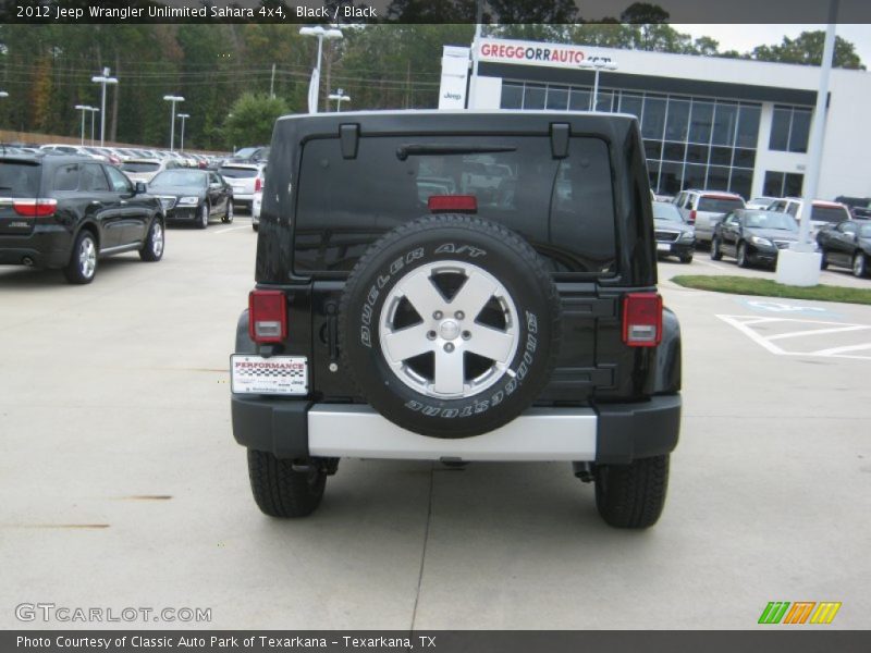 Black / Black 2012 Jeep Wrangler Unlimited Sahara 4x4