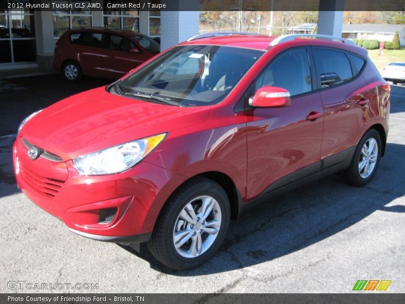 Garnet Red / Taupe 2012 Hyundai Tucson GLS AWD