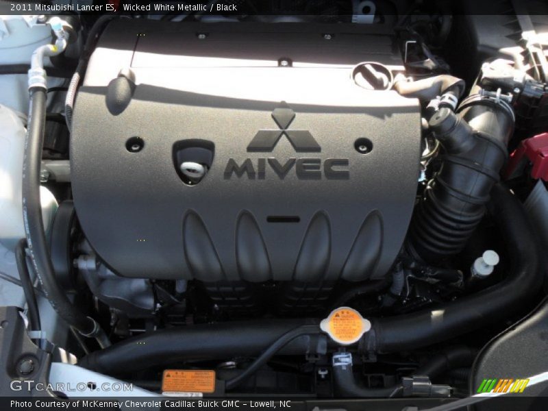 Wicked White Metallic / Black 2011 Mitsubishi Lancer ES