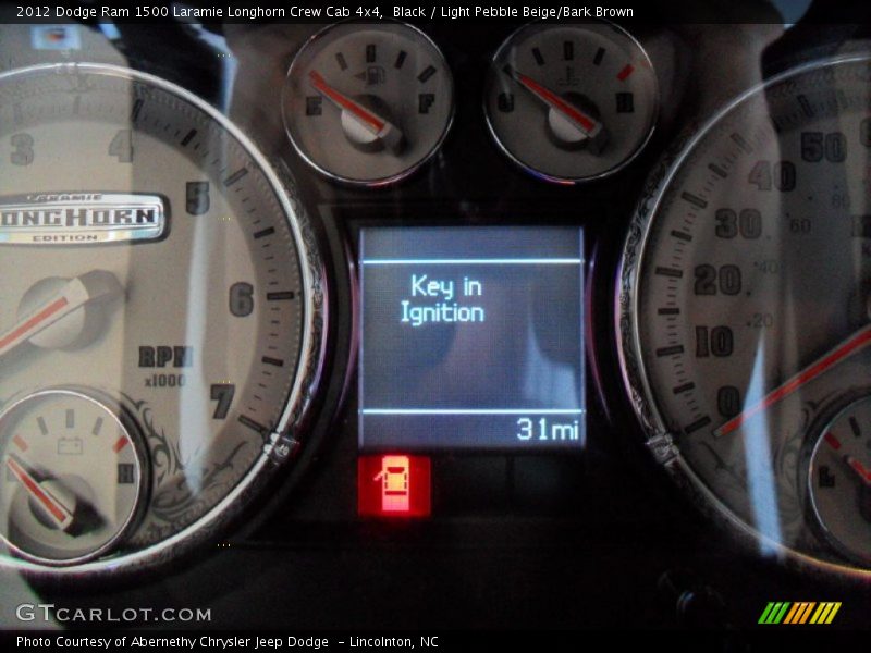 Black / Light Pebble Beige/Bark Brown 2012 Dodge Ram 1500 Laramie Longhorn Crew Cab 4x4