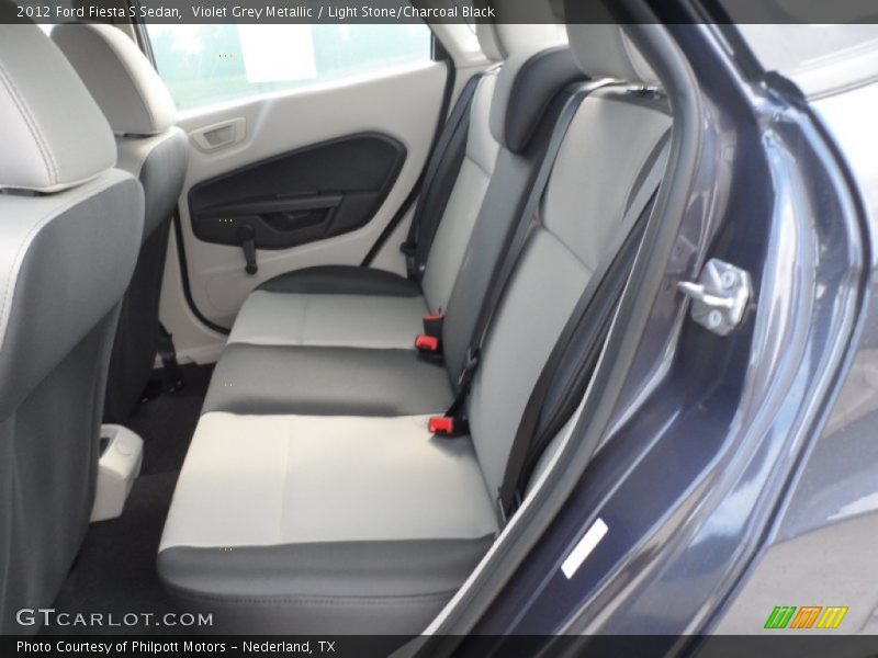 Rear seat in Light Stone/Charcoal Black - 2012 Ford Fiesta S Sedan