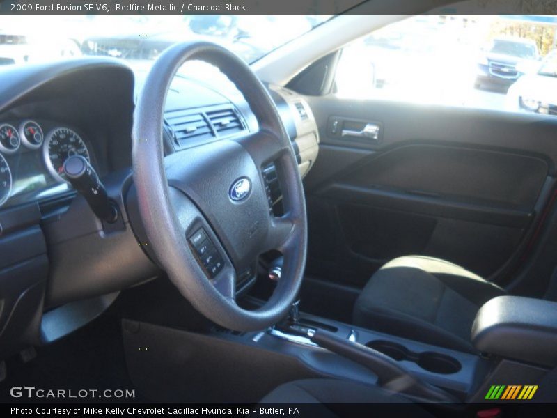 Redfire Metallic / Charcoal Black 2009 Ford Fusion SE V6