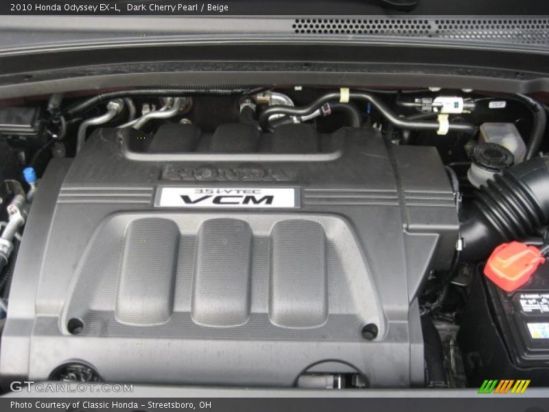 Dark Cherry Pearl / Beige 2010 Honda Odyssey EX-L