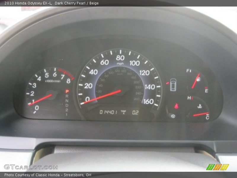 Dark Cherry Pearl / Beige 2010 Honda Odyssey EX-L