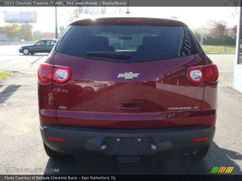 Red Jewel Metallic / Ebony/Ebony 2011 Chevrolet Traverse LT AWD