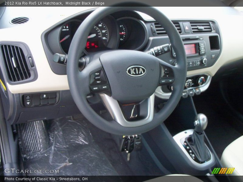 Dashboard of 2012 Rio Rio5 LX Hatchback