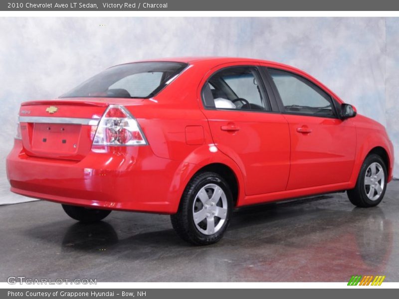 Victory Red / Charcoal 2010 Chevrolet Aveo LT Sedan