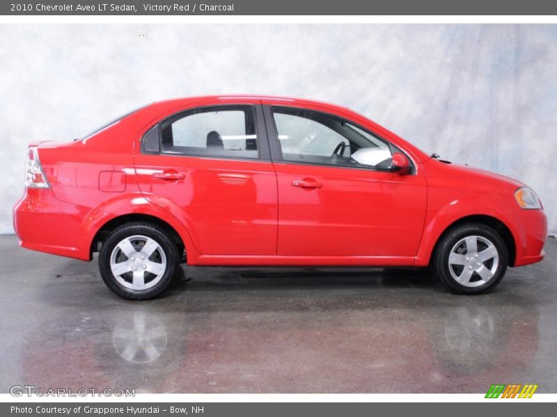 Victory Red / Charcoal 2010 Chevrolet Aveo LT Sedan