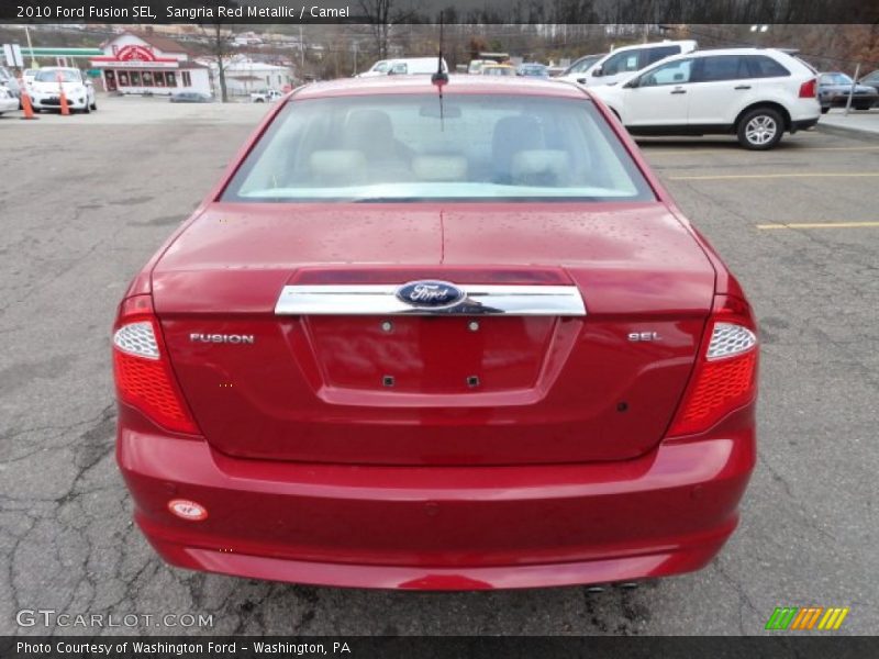 Sangria Red Metallic / Camel 2010 Ford Fusion SEL