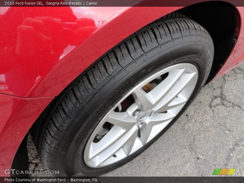 Sangria Red Metallic / Camel 2010 Ford Fusion SEL