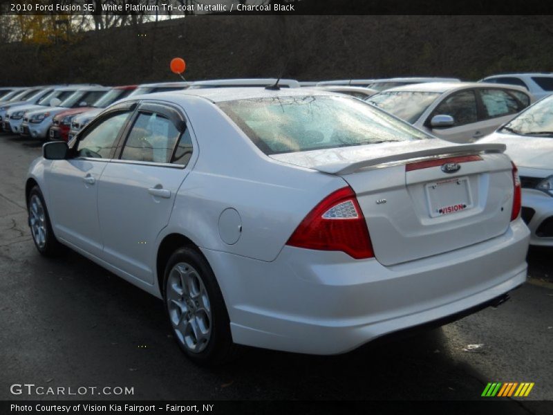 White Platinum Tri-coat Metallic / Charcoal Black 2010 Ford Fusion SE