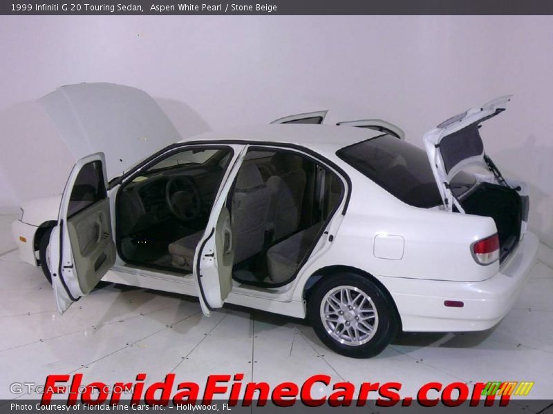 Aspen White Pearl / Stone Beige 1999 Infiniti G 20 Touring Sedan