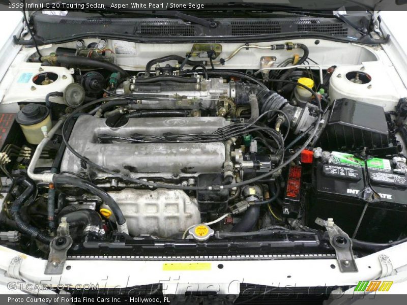 Aspen White Pearl / Stone Beige 1999 Infiniti G 20 Touring Sedan