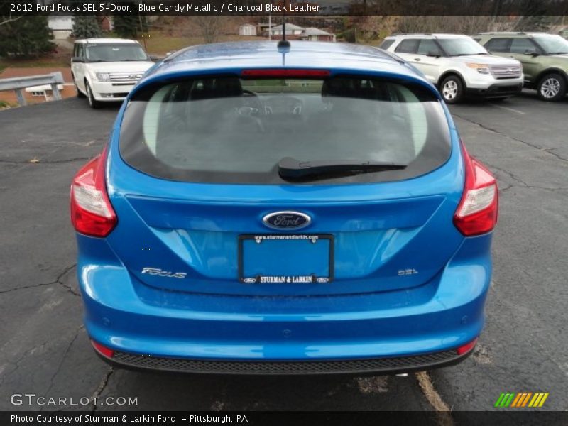 Blue Candy Metallic / Charcoal Black Leather 2012 Ford Focus SEL 5-Door