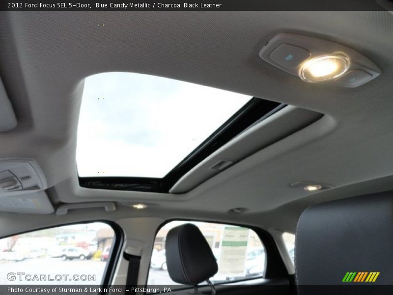 Blue Candy Metallic / Charcoal Black Leather 2012 Ford Focus SEL 5-Door