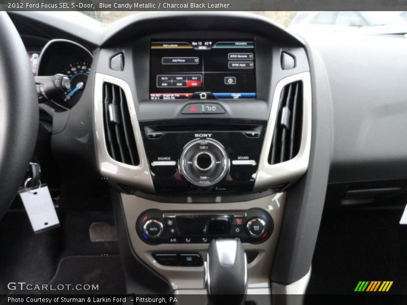 Blue Candy Metallic / Charcoal Black Leather 2012 Ford Focus SEL 5-Door
