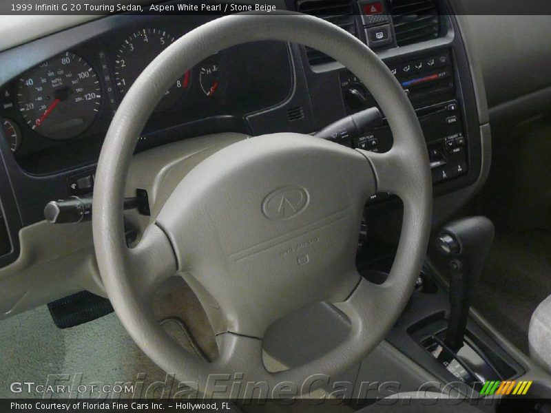 Aspen White Pearl / Stone Beige 1999 Infiniti G 20 Touring Sedan