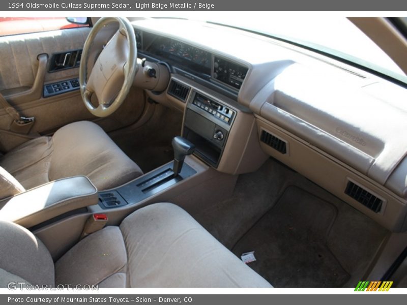 Light Beige Metallic / Beige 1994 Oldsmobile Cutlass Supreme Sedan