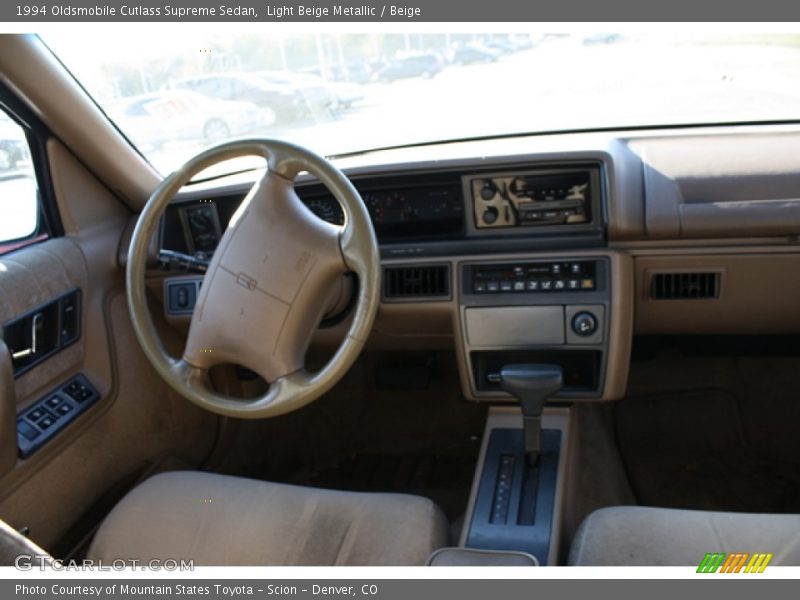 Light Beige Metallic / Beige 1994 Oldsmobile Cutlass Supreme Sedan