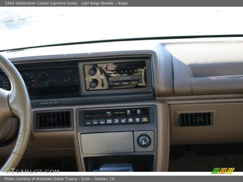 Light Beige Metallic / Beige 1994 Oldsmobile Cutlass Supreme Sedan