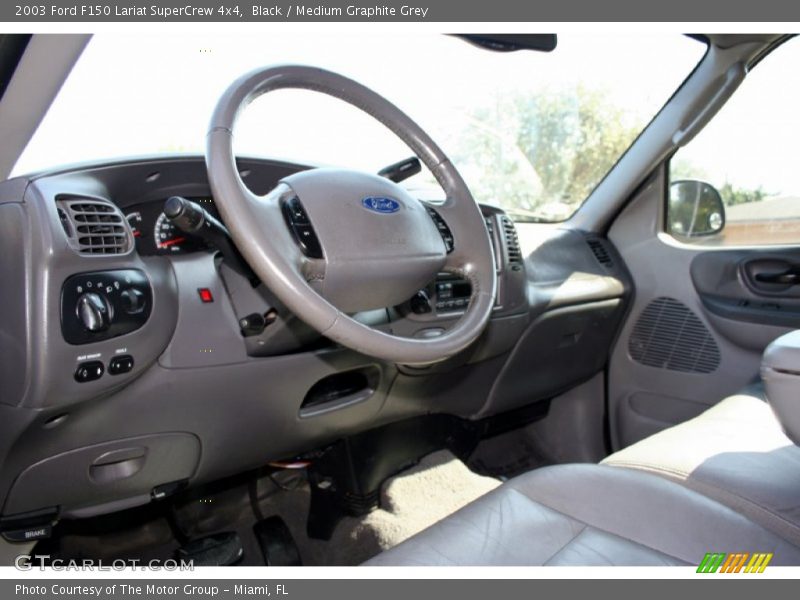 Black / Medium Graphite Grey 2003 Ford F150 Lariat SuperCrew 4x4