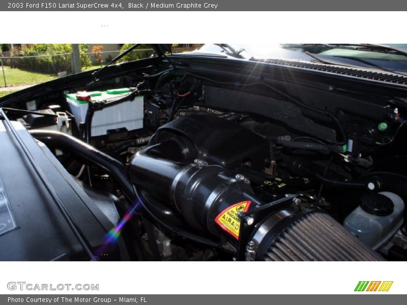 Black / Medium Graphite Grey 2003 Ford F150 Lariat SuperCrew 4x4
