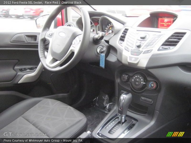Race Red / Charcoal Black 2012 Ford Fiesta SEL Sedan