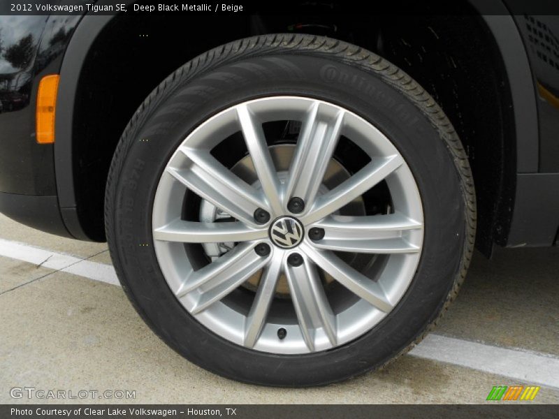 Deep Black Metallic / Beige 2012 Volkswagen Tiguan SE