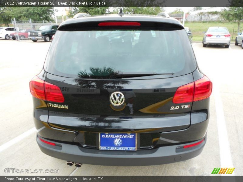 Deep Black Metallic / Beige 2012 Volkswagen Tiguan SE