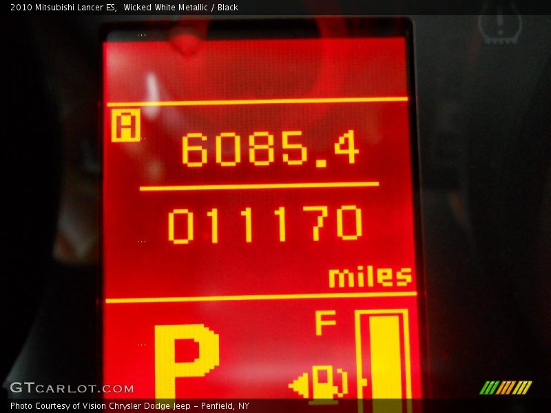 Wicked White Metallic / Black 2010 Mitsubishi Lancer ES