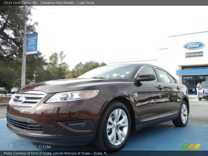 Cinnamon Red Metallic / Light Stone 2010 Ford Taurus SEL