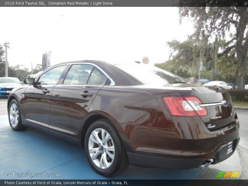 Cinnamon Red Metallic / Light Stone 2010 Ford Taurus SEL