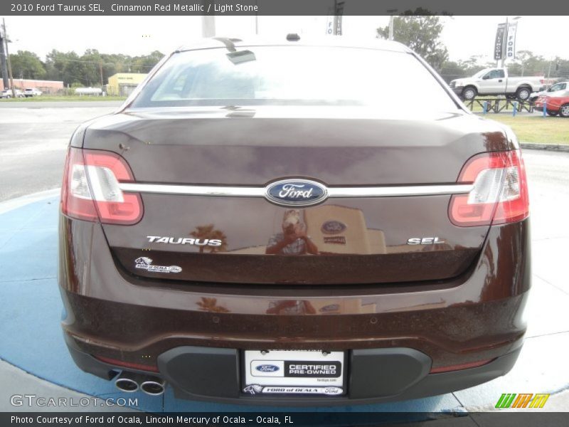 Cinnamon Red Metallic / Light Stone 2010 Ford Taurus SEL