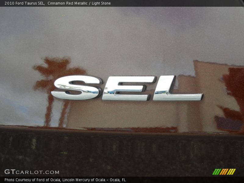 Cinnamon Red Metallic / Light Stone 2010 Ford Taurus SEL