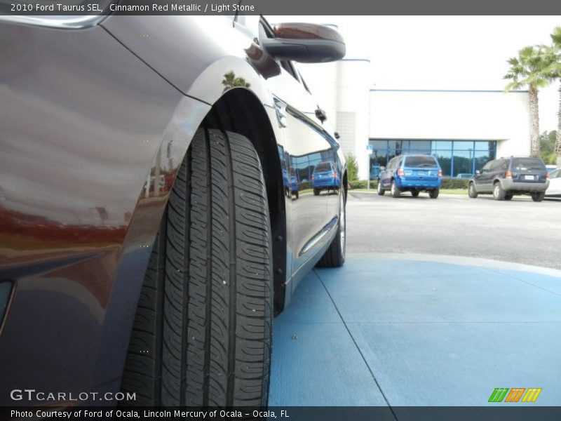 Cinnamon Red Metallic / Light Stone 2010 Ford Taurus SEL
