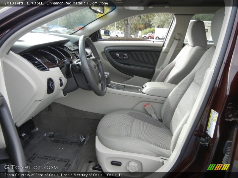 Cinnamon Red Metallic / Light Stone 2010 Ford Taurus SEL
