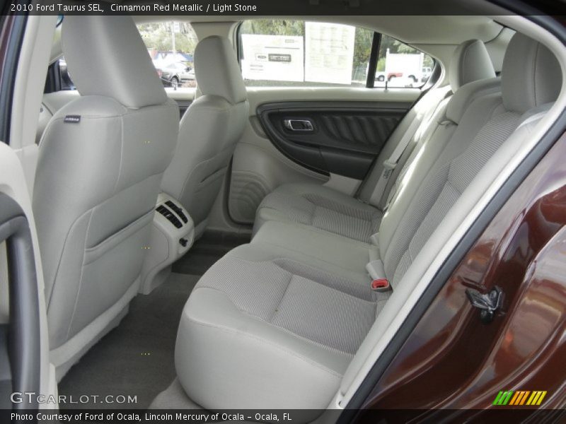 Cinnamon Red Metallic / Light Stone 2010 Ford Taurus SEL