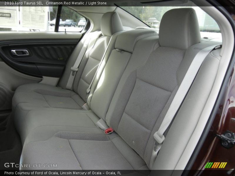 Cinnamon Red Metallic / Light Stone 2010 Ford Taurus SEL