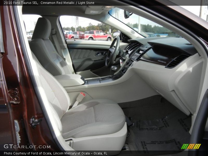 Cinnamon Red Metallic / Light Stone 2010 Ford Taurus SEL