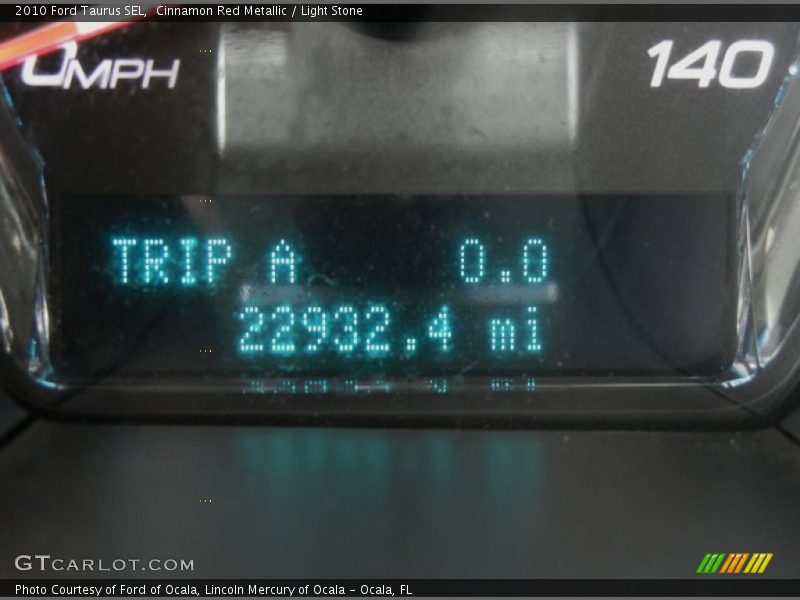 Cinnamon Red Metallic / Light Stone 2010 Ford Taurus SEL