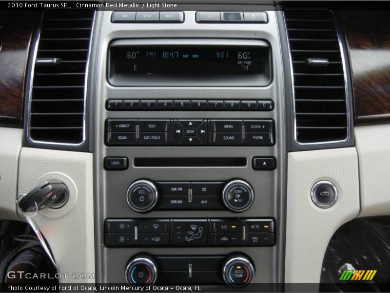 Cinnamon Red Metallic / Light Stone 2010 Ford Taurus SEL