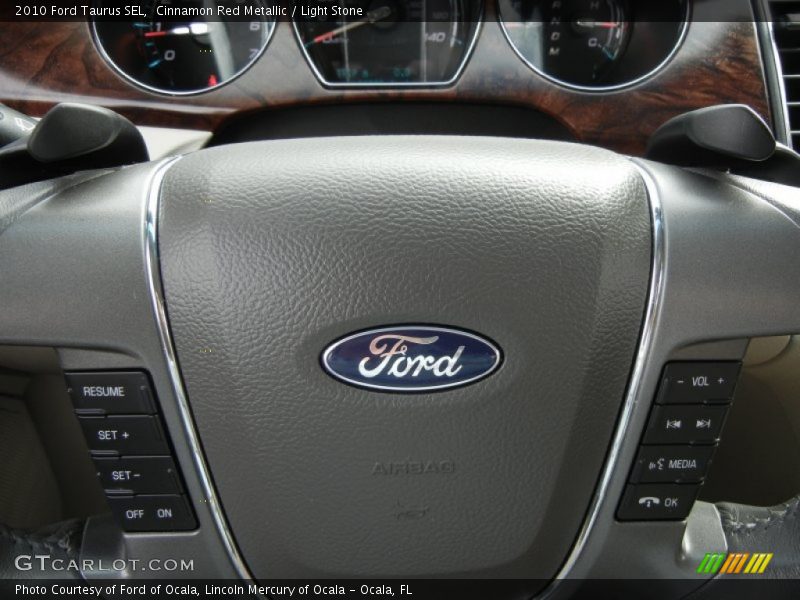 Cinnamon Red Metallic / Light Stone 2010 Ford Taurus SEL
