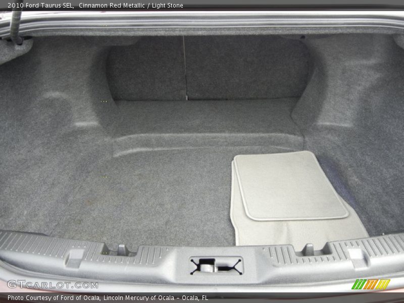 Cinnamon Red Metallic / Light Stone 2010 Ford Taurus SEL