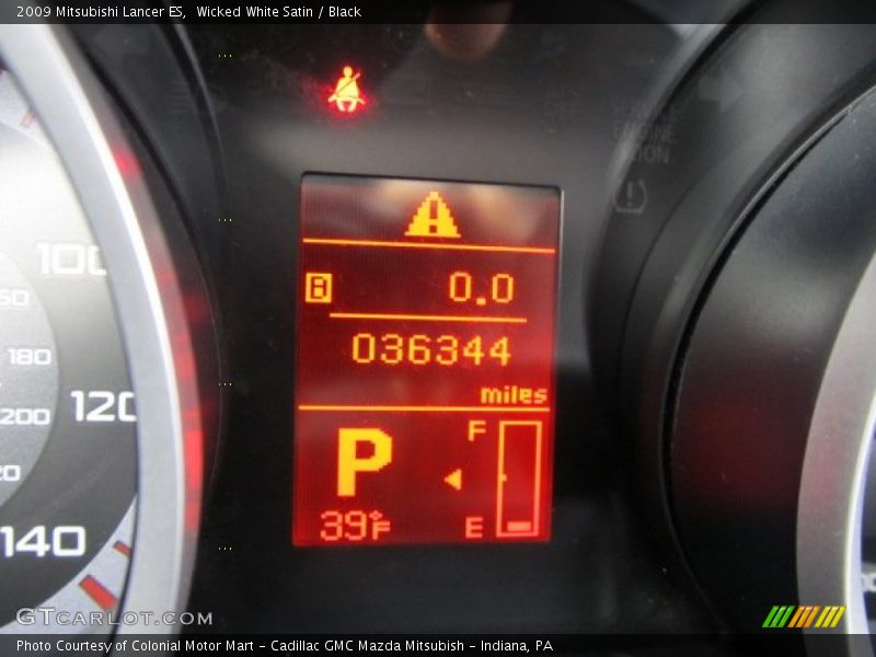 Wicked White Satin / Black 2009 Mitsubishi Lancer ES