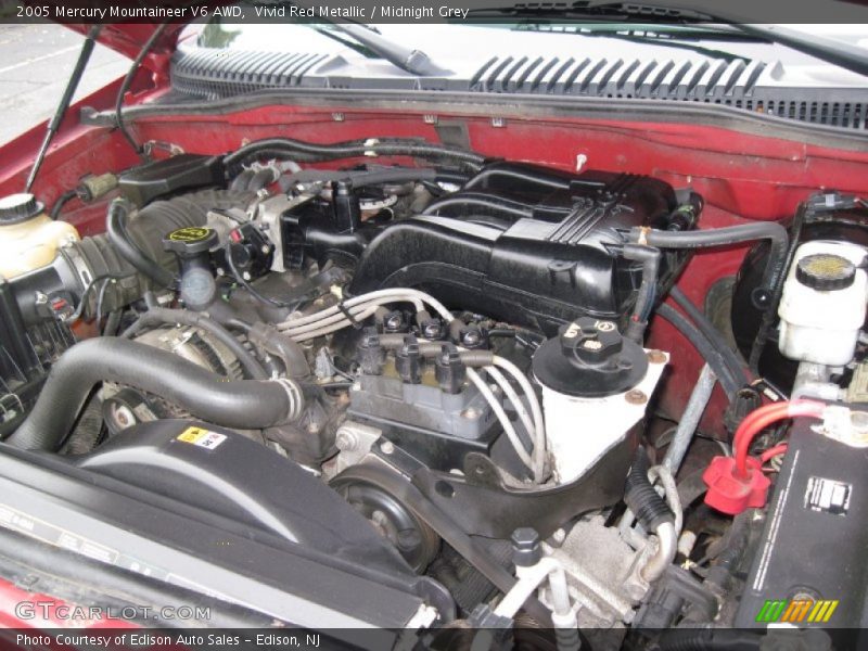 Vivid Red Metallic / Midnight Grey 2005 Mercury Mountaineer V6 AWD