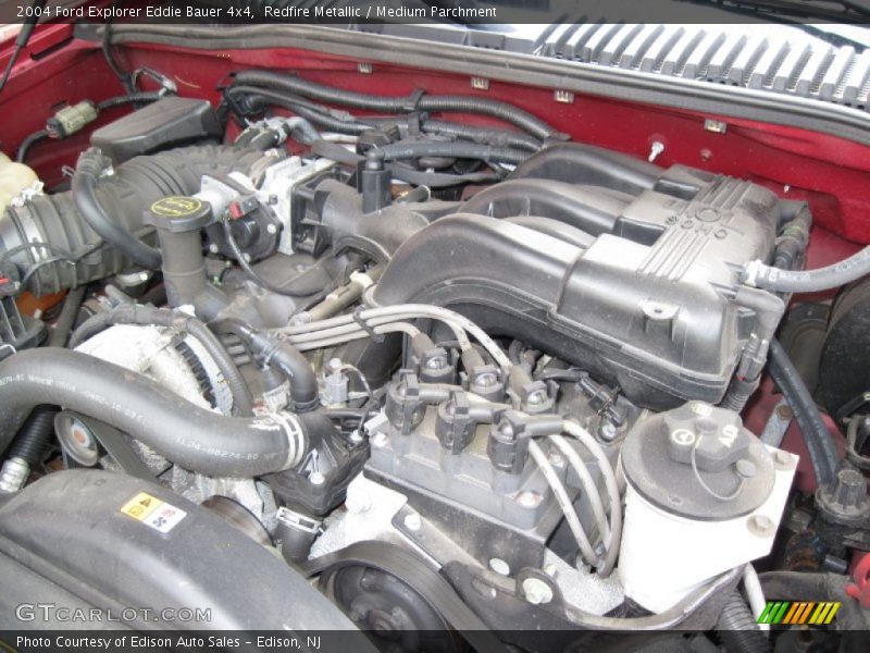 Redfire Metallic / Medium Parchment 2004 Ford Explorer Eddie Bauer 4x4