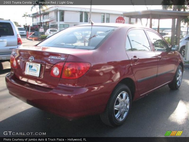 Impulse Red / Light Gray 2003 Toyota Corolla CE